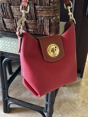 Dooney andBourke red pebble leather turnlock satchel NWT